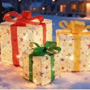 Three Piece Sparkling Stars Lighted indoor/outdoor Christmas Gift Box Set.